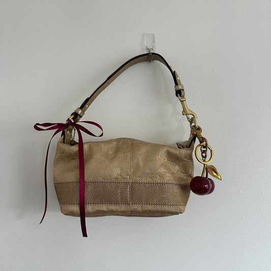 y2k coach gold shimmer top handle bag