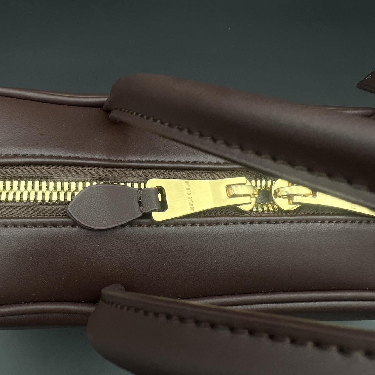 Brown leather Miu Miu bag with gold hardware