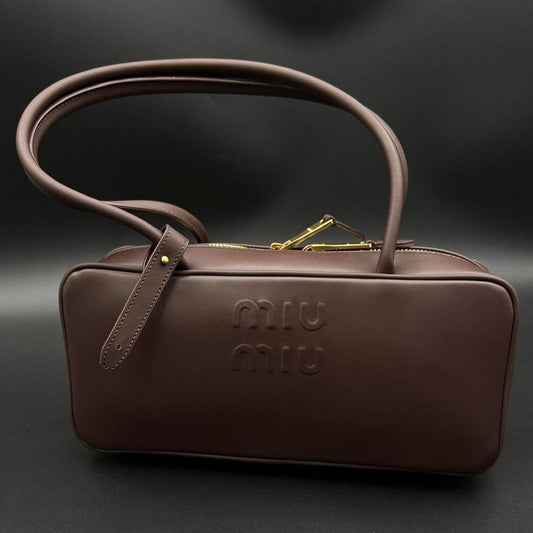 Brown leather Miu Miu bag with gold hardware