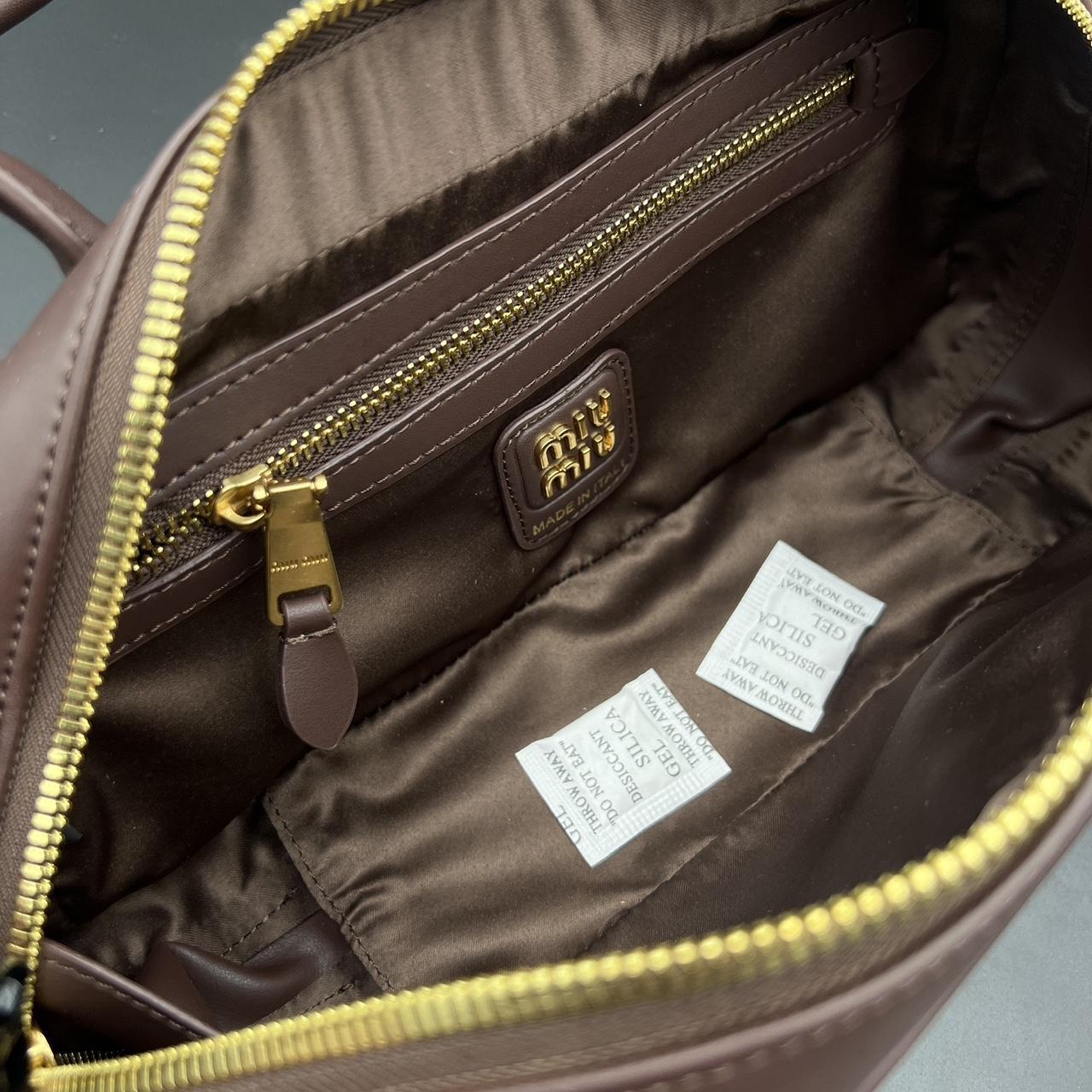 Brown leather Miu Miu bag with gold hardware